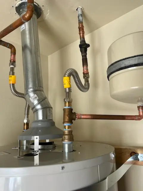 Water heater installation and plumbing repair in Etta